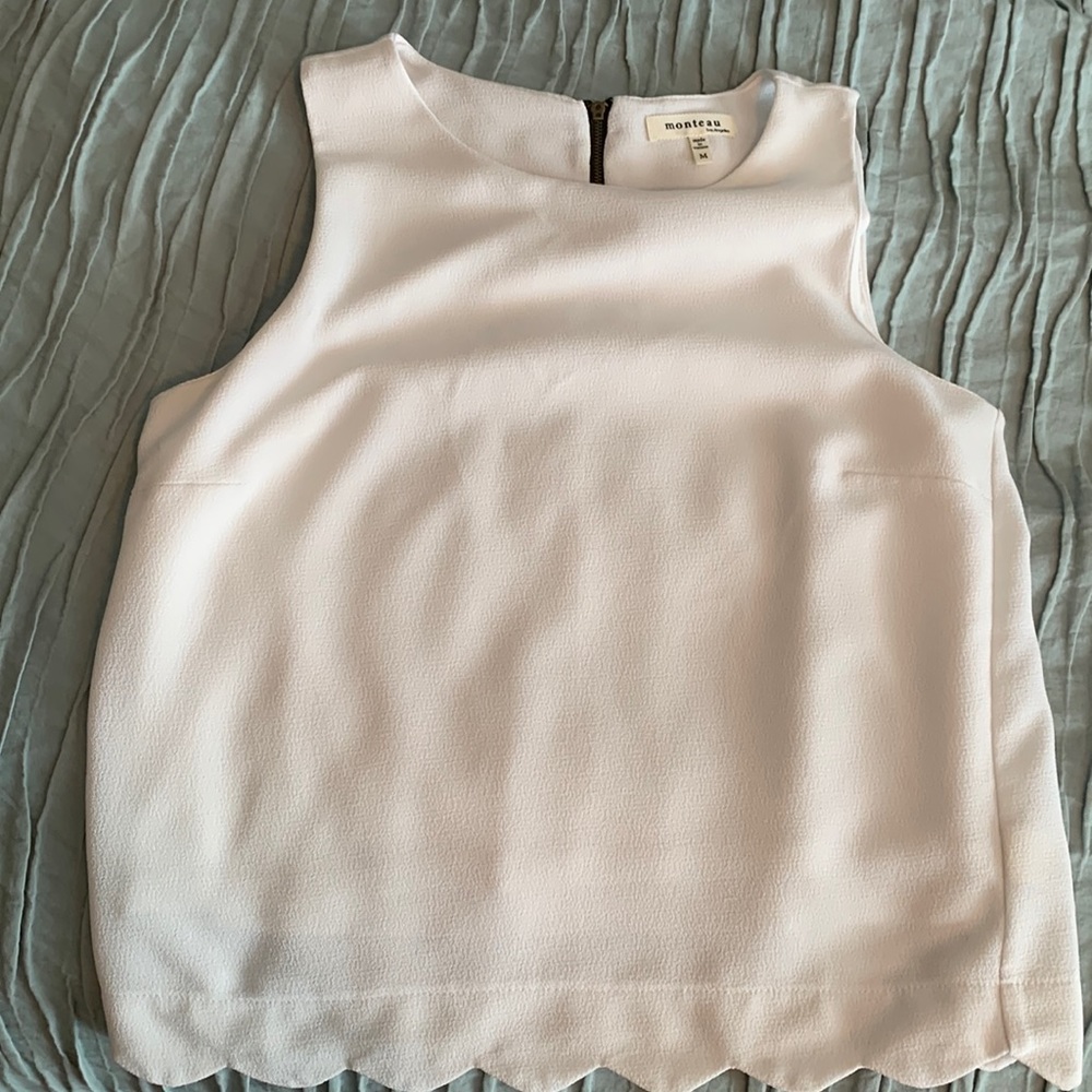 White sleeveless top
